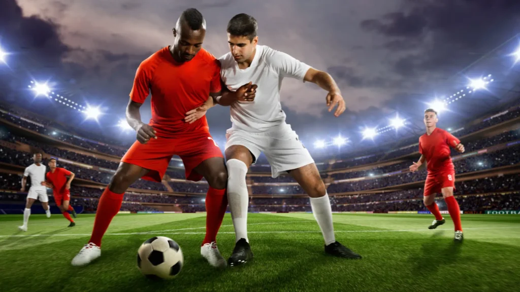 players snatch football from each other