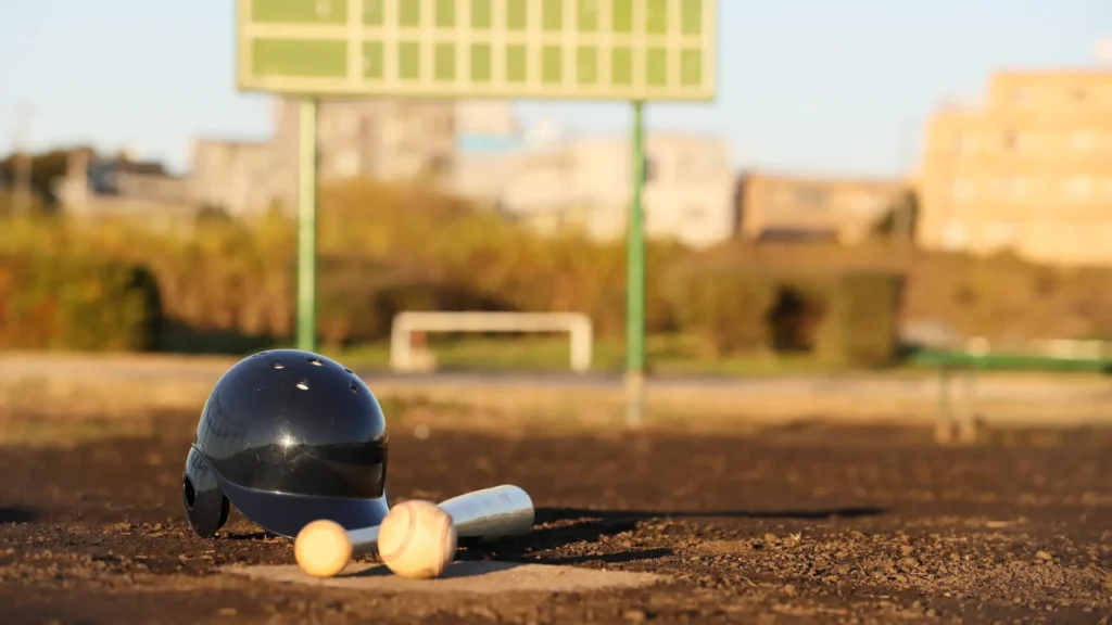 softball helmet ,bat and ball