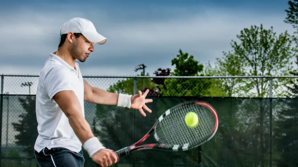 a men hit tennis ball